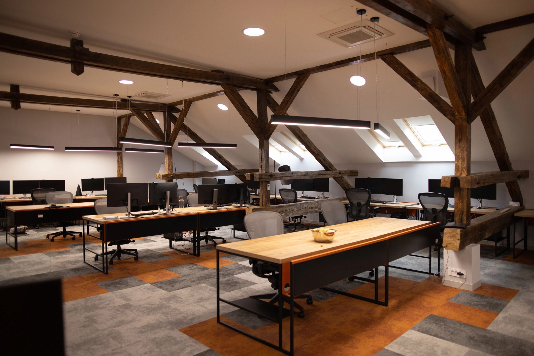 An empty office with computer equipment