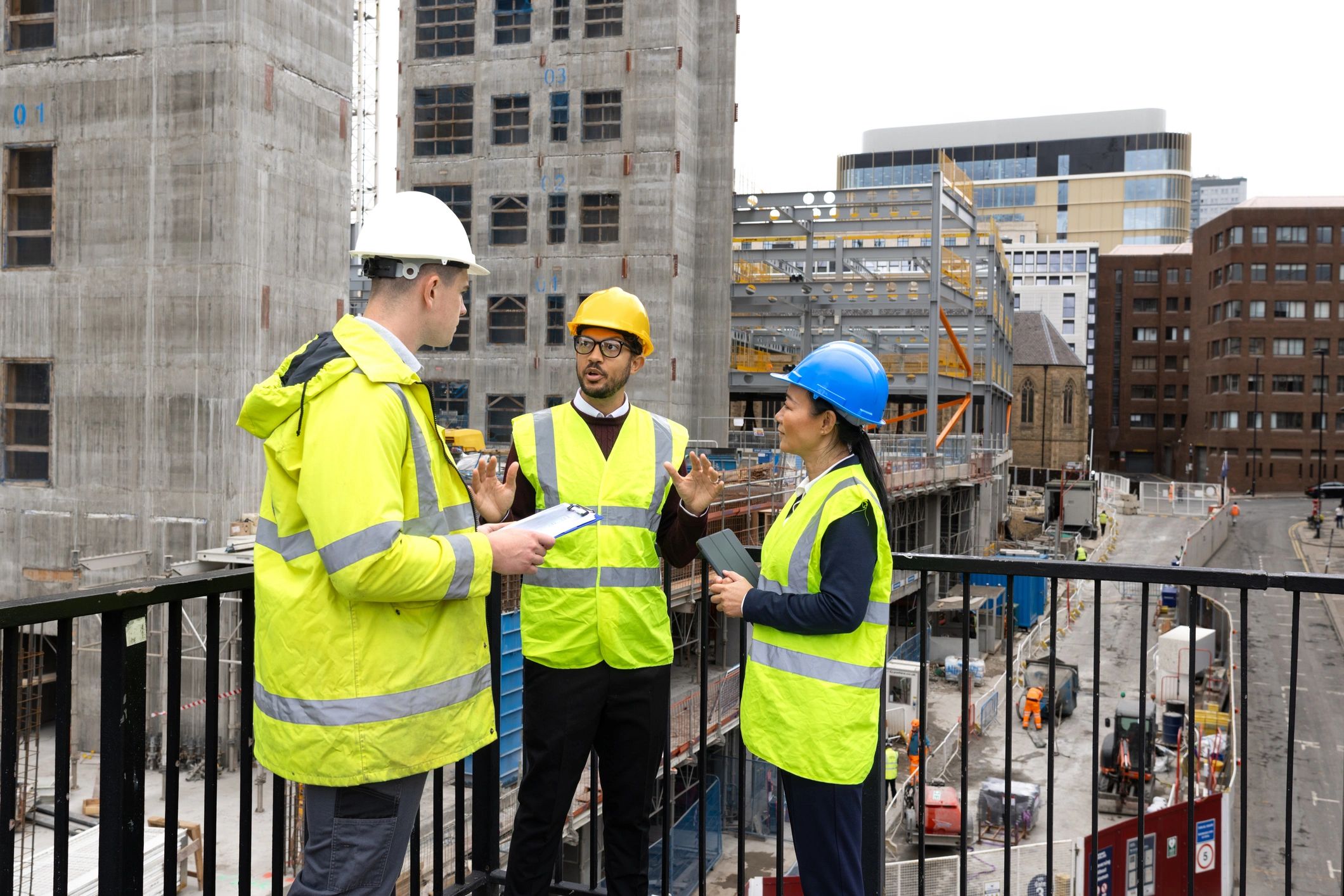 Pico Construction team reviewing plans at a job site
